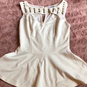 Peplum top with detailing